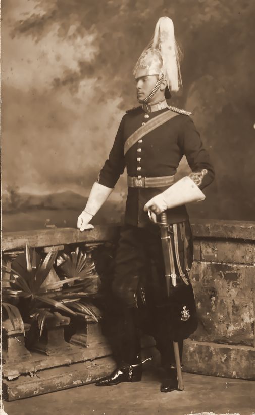 An officer in full cavalry dress with a plumed helmet. Not yet identified; the white plume fits the Inniskilling Dragoons.