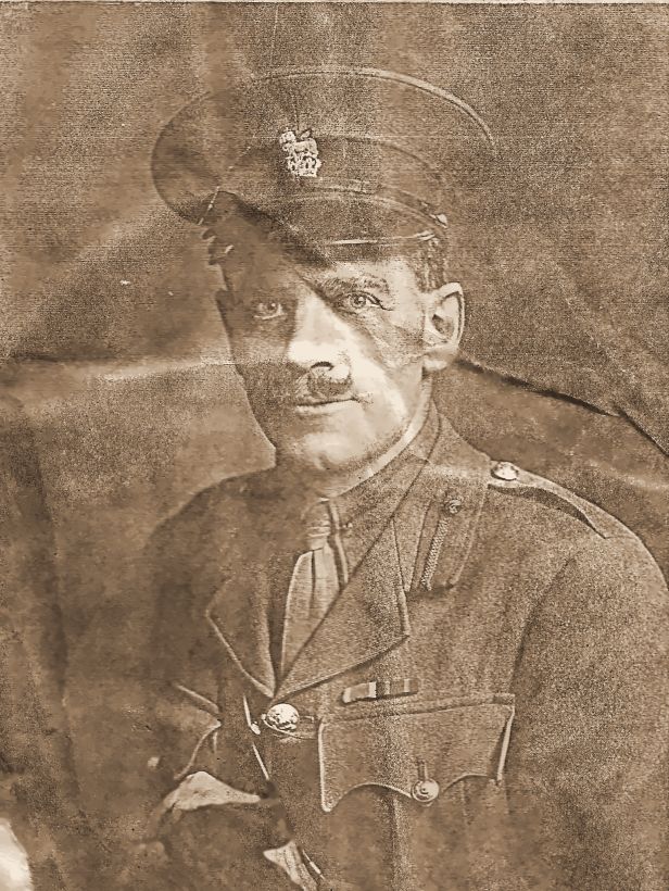 Probably Dudley Graham Johnson, photographed in London during the First World War. The family recognises him from the street photograph above, though his cap badge here, which looks like a lion standing on a crown, differs from the round badge he wears there.