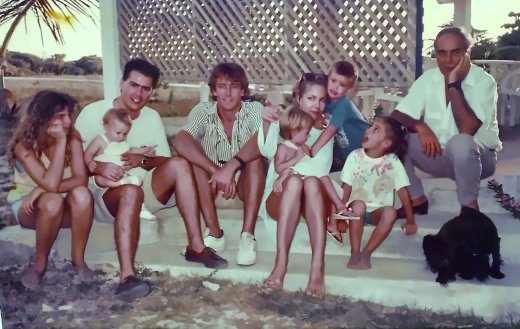 Anguilla, around 1988, at Alan Permuy’s Oasis. From left: Chantal; me, holding Juliet; Peter Tromp; Kire, holding a baby whose name we don’t know, with Luca behind her; Tara; and my father, Giorgio Piazzi.