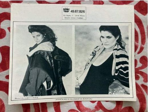The reverse. Fashion Model, Via Seprio 2, Milano, telex 333161 FASHMO — and along the bottom, “Photo’s by model workshop.” Shot at Hinchingham, printed in Italy, carrying a Milan telephone number. The whole pipeline on one card.