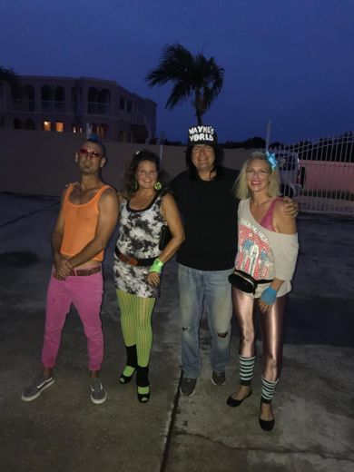 Anguilla during Covid, with no lockdown because the island was closed and had no cases: with Chloe and Theron of Picante, on the way to an eighties party at Ani Villas.