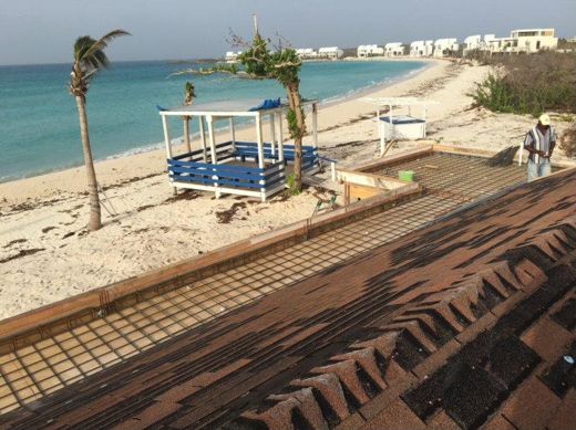 The shingles going onto the roof, the beach and the bar below.