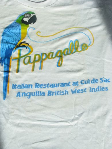 A Pappagallo T-shirt: “Italian Restaurant at Cul de Sac, Anguilla, British West Indies”. My father opened Pappagallo in 1987 and named it after Al Pappagallo in Bologna.
