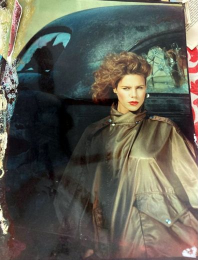 A leather trench coat. The print is water-stained across the top.