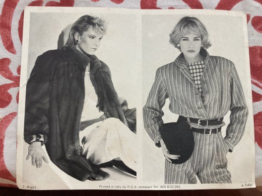 Two composite pictures, one in fur, one in a pinstriped suit, printed in Italy.