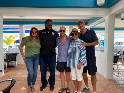 With Tim and Mary at Trattoria, 2022. They came in at the very beginning and became fast friends, and after Irma Tim contributed toward the rebuilding and helped see our staff through the hardship that followed.