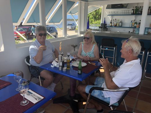 Tom and Patti Cheseborough and Gunner at Trattoria, March 2018. When we reopened after Irma, the day before Christmas, they were the first people through the door.